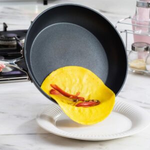 a frying pan with a chili inside of it